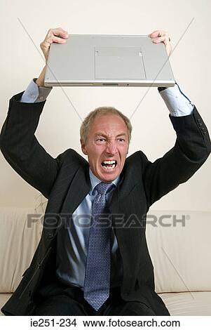 An angry businessman View Large Photo Image Picture - An angry businessman. Fotosearch
