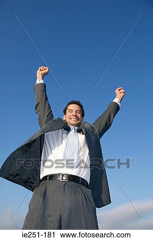 Stock Image - An elated businessman. Fotosearch