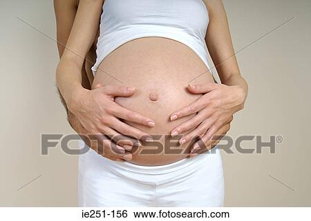 An expecting couple View Large Photo Image Stock Photograph - An expecting couple. Fotosearch