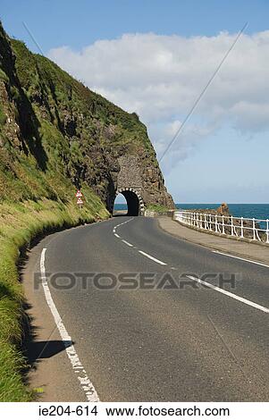 Black cave tunnel antrim coast View Large Photo Image Picture - Black cave tunnel antrim coast. Fotosearch