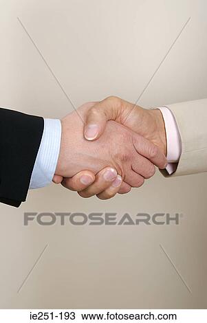 Businessmen shaking hands View Large Photo Image Stock Image - Businessmen shaking hands. Fotosearch