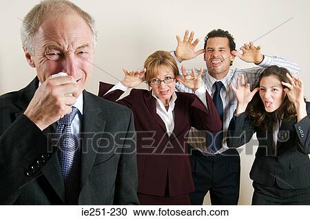 Businesspeople bullying a colleague View Large Photo Image Stock Image - Businesspeople bullying a colleague. Fotosearch