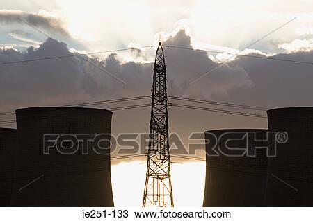Electrical tower and smokestacks View Large Photo Image Stock Image - Electrical tower and smokestacks. Fotosearch