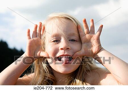 Girl making faces View Large Photo Image Stock Image - Girl making faces. Fotosearch