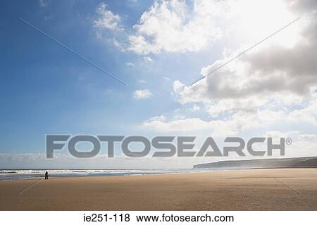 People on a beach View Large Photo Image Stock Photo - People on a beach. Fotosearch