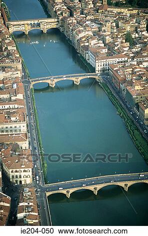 Stock Image - Ponte vecchio over arno river . Fotosearch