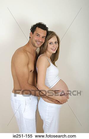 Portrait of a pregnant couple View Large Photo Image Stock Photography - Portrait of a pregnant couple. Fotosearch