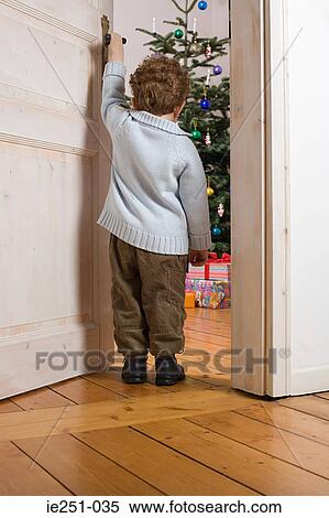 Rear view of a boy View Large Photo Image Stock Photography - Rear view of a boy. Fotosearch