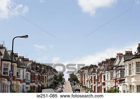 Stock Photography - Row of terraced houses on a hill. Fotosearch