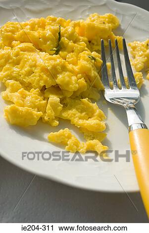 Scrambled egg and rosemary View Large Photo Image Stock Image - Scrambled egg and rosemary. Fotosearch