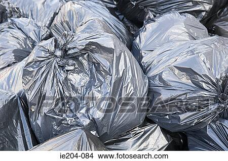 Stack of rubbish bags View Large Photo Image Picture - Stack of rubbish bags. Fotosearch