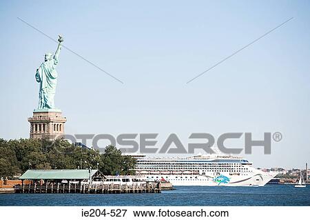 Statue of liberty and cruise ship View Large Photo Image Stock Photo - Statue of liberty and cruise ship. Fotosearch