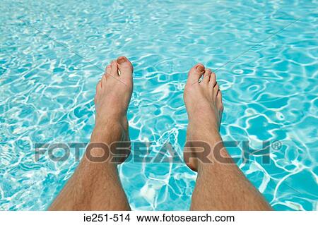 Legs of man by pool View Large Photo Image Picture - Legs of man by pool. Fotosearch
