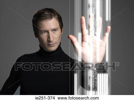 Picture - Man and technology. Fotosearch