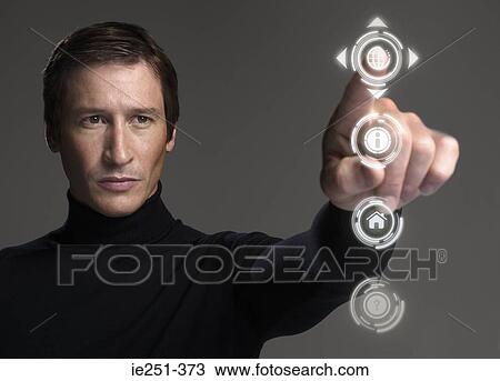 Man touching symbol View Large Photo Image Stock Image - Man touching symbol. Fotosearch
