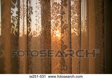 Sunlight through net curtain View Large Photo Image Stock Image - Sunlight through net curtain. Fotosearch