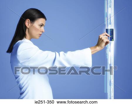 Woman using key card View Large Photo Image Stock Image - Woman using key card. Fotosearch