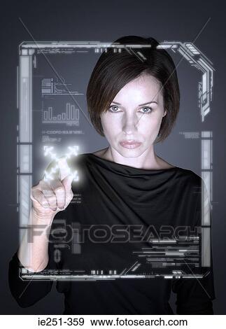 Stock Photo - Woman with touch screen. Fotosearch