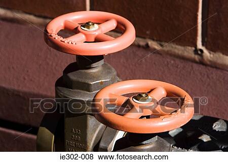 A fire hose View Large Photo Image Stock Photo - A fire hose. Fotosearch