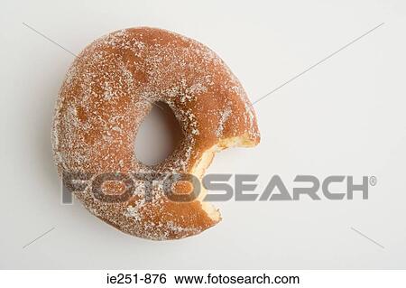 Doughnut with missing bite View Large Photo Image Stock Photograph - Doughnut with missing bite. Fotosearch