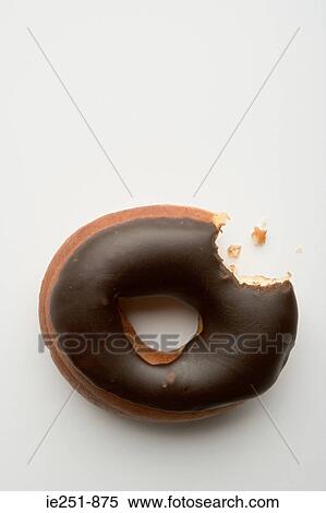 Stock Photography - Doughnut with missing bite. Fotosearch
