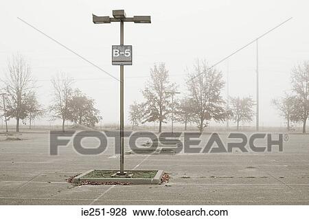 Empty parking lot View Large Photo Image Stock Photo - Empty parking lot. Fotosearch