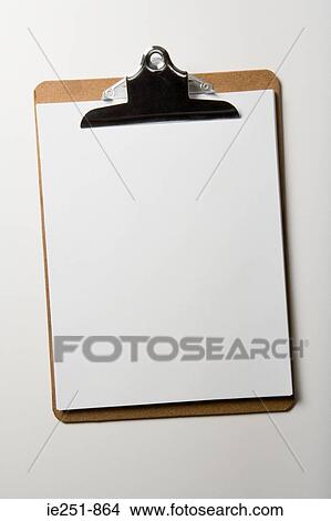Paper on clipboard View Large Photo Image Picture - Paper on clipboard. Fotosearch