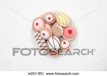 Plate of knitted cakes View Large Photo Image Stock Image - Plate of knitted cakes. Fotosearch