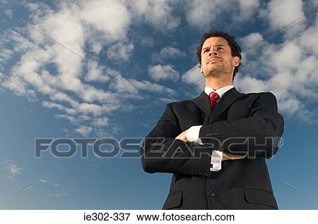 Businessman with arms crossed View Large Photo Image Stock Photo - Businessman with arms crossed. Fotosearch