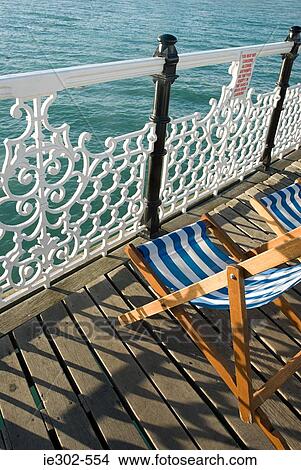 Deckchairs by the sea View Large Photo Image Picture - Deckchairs by the sea. Fotosearch