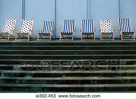 Deckchairs in a row View Large Photo Image Stock Image - Deckchairs in a row. Fotosearch