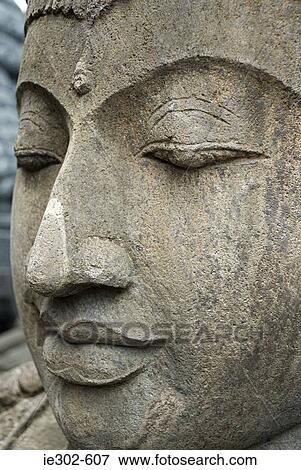 Face of a statue View Large Photo Image Stock Photo - Face of a statue. Fotosearch