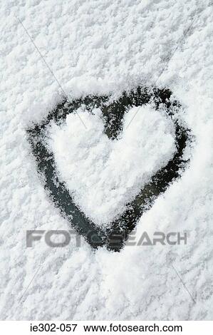 Heart in snow View Large Photo Image Stock Photo - Heart in snow. Fotosearch