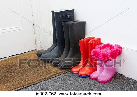 Rubber boots in hallway View Large Photo Image Stock Image - Rubber boots in hallway. Fotosearch