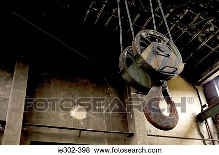 Stock Photo - Rusting hook and winch. Fotosearch