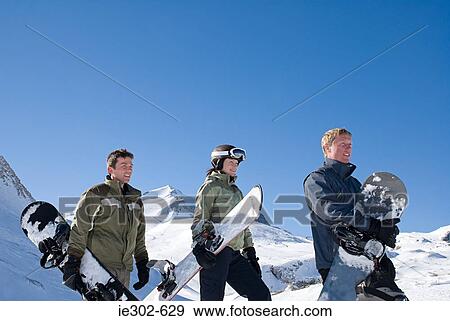 Stock Photo - Snowboarders. Fotosearch