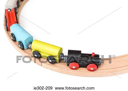 Toy train on track View Large Photo Image Stock Photo - Toy train on track. Fotosearch