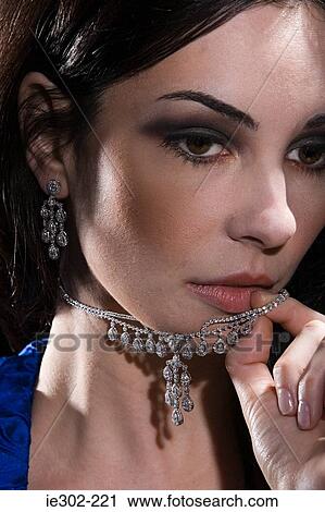 Woman with diamond jewelry View Large Photo Image Stock Image - Woman with diamond jewelry. Fotosearch