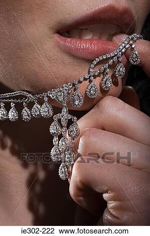 Stock Image - Woman with diamond necklace. Fotosearch