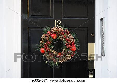 Wreath on a door View Large Photo Image Stock Image - Wreath on a door. Fotosearch