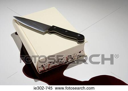 Stock Photography - A book with blood dripping out of it. Fotosearch
