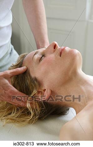 A woman having a massage View Large Photo Image Stock Image - A woman having a massage. Fotosearch