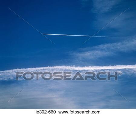 An airplanes vapour trail in the sky View Large Photo Image Stock Image - An airplanes vapour trail in the sky. Fotosearch