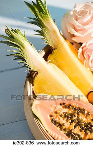 Papaya and pineapple View Large Photo Image Stock Photograph - Papaya and pineapple. Fotosearch