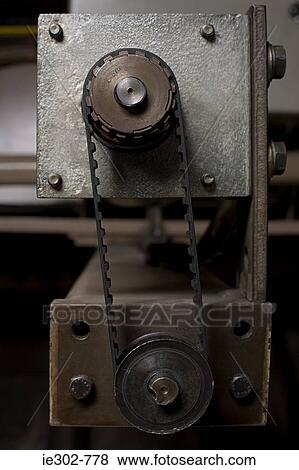 Stock Photo - Timing belt on machine. Fotosearch