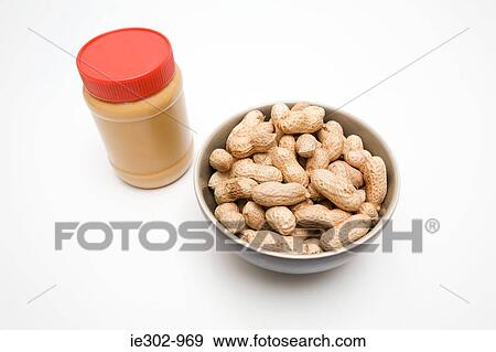 A jar of peanut butter and peanuts View Large Photo Image Stock Photo - A jar of peanut butter and peanuts. Fotosearch