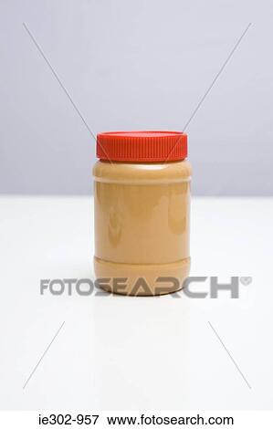 Stock Photo - A jar of peanut butter. Fotosearch