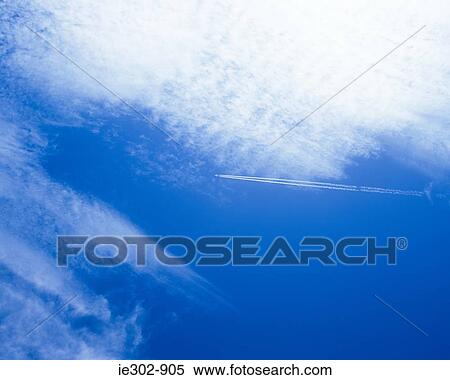 A vapour trail of a plane View Large Photo Image Stock Photography - A vapour trail of a plane. Fotosearch