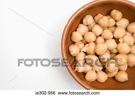 Chick peas in a dish View Large Photo Image Stock Photograph - Chick peas in a dish. Fotosearch