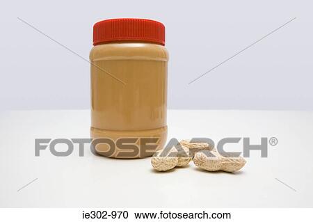 Jar of peanut butter and peanuts View Large Photo Image Stock Image - Jar of peanut butter and peanuts. Fotosearch